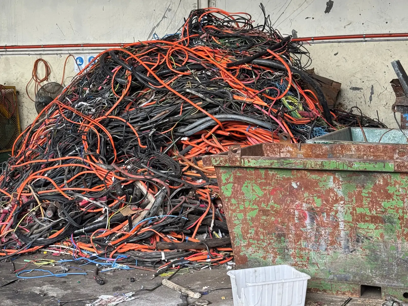 One of the yard bins beside a pile of collected cable at Ingleburn